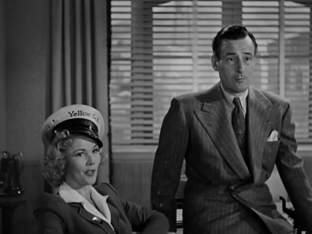 Tom Conway et Veda Ann Borg dans le film policier The Falcon in Hollywood (1944) de Gordon Douglas