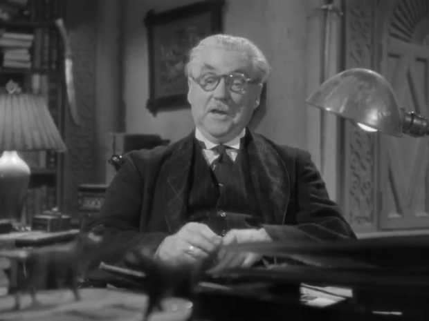 Nigel Bruce dans le film Sherlock Holmes et la clef Nigel Bruce dans le film Sherlock Holmes et la clef