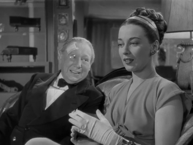 Edmond Breon et Patricia Morison dans le film Sherlock Holmes et la clef Edmond Breon et Patricia Morison dans le film Sherlock Holmes et la clef