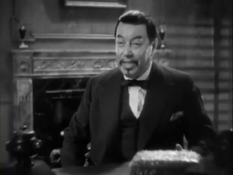 Warner Oland dans le film policier Charlie Chan in London (1934) d'Eugene Forde Warner Oland dans le film policier Charlie Chan in London (1934) d'Eugene Forde