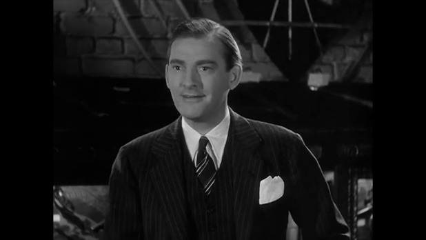 Ted Osborn est Tom Agnew dans le film américain Charlie Chan at the Wax museum (1940) de Lynn Shores Ted Osborn est Tom Agnew dans le film américain Charlie Chan at the Wax museum (1940) de Lynn Shores