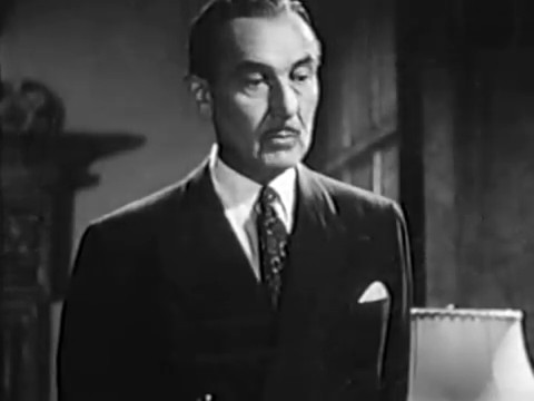Paul Lukas dans le film canadien Whispering City (1947) de Fedor Ozep Paul Lukas dans le film canadien Whispering City (1947) de Fedor Ozep