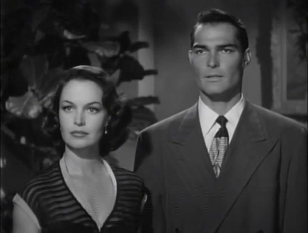 Dorothy Hart et John Russell dans le film Undertow (Une balle dans le dos, 1949) de William Castle