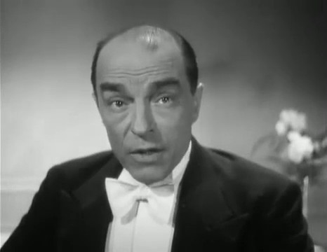 Jacques Baumer est le commissaire de police dans le film policier Café de Paris (1938) d'Yves Mirande Jacques Baumer est le commissaire de police dans le film policier Café de Paris (1938) d'Yves Mirande