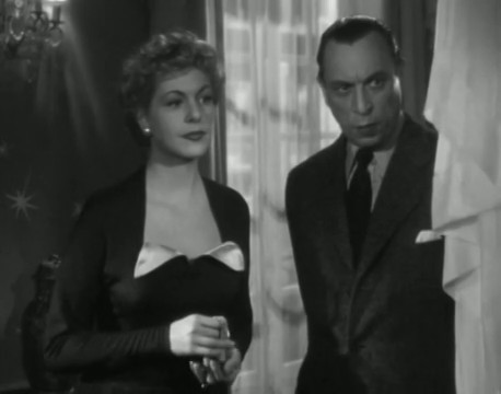 Madeleine Robinson et Louis Jouvet dans le film policier Entre onze heures et minuit (1949) de Henry Decoin