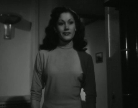 Simone Sylvestre dans le film policier Entre onze heures et minuit (1949) de Henry Decoin