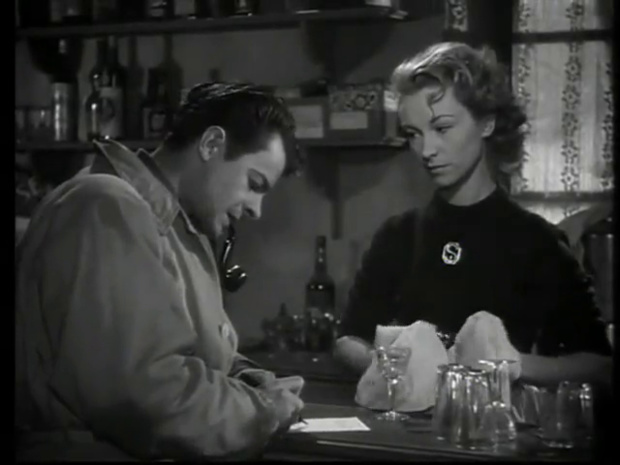 Serge Reggiani et Janine Darcey dans le film français Le mystère de la chambre jaune (1949) de Henri Aisner