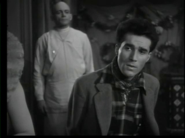 Michel Piccoli dans le film Le parfum de la dame en noir (1949) de Louis Daquin