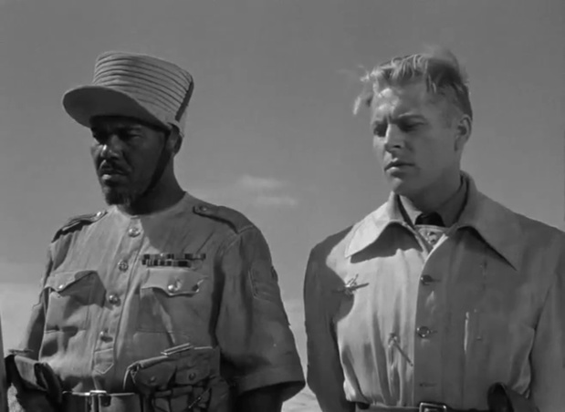 Rex Ingram et Kurt Krueger dans le film de guerre américain Sahara (1943) de Zoltan Korda