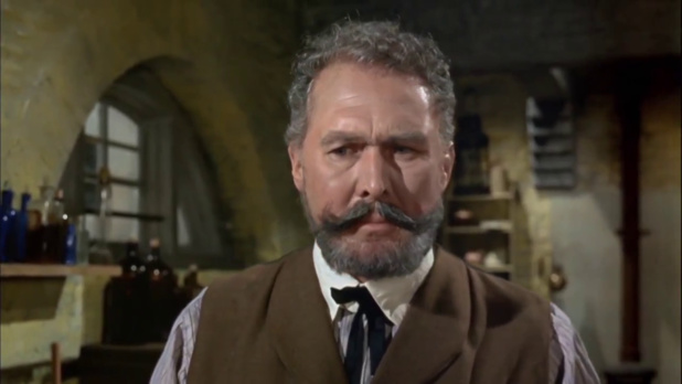 Anthony Quayle dans le film policier A study in terror (Sherlock Holmes contre Jack l'éventreur, 1965) de James Hill