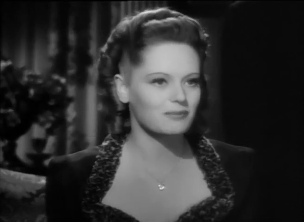 La comédienne Alexis Smith dans le film policier américain Conflict (La mort n'était pas au rendez-vous, 1945) de Curtis Bernhardt