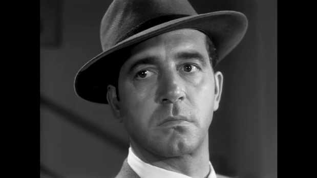 John Payne dans le film noir Kansas City Confidential (Le quatrième homme, 1952) de Phil Karlson John Payne dans le film noir Kansas City Confidential (Le quatrième homme, 1952) de Phil Karlson