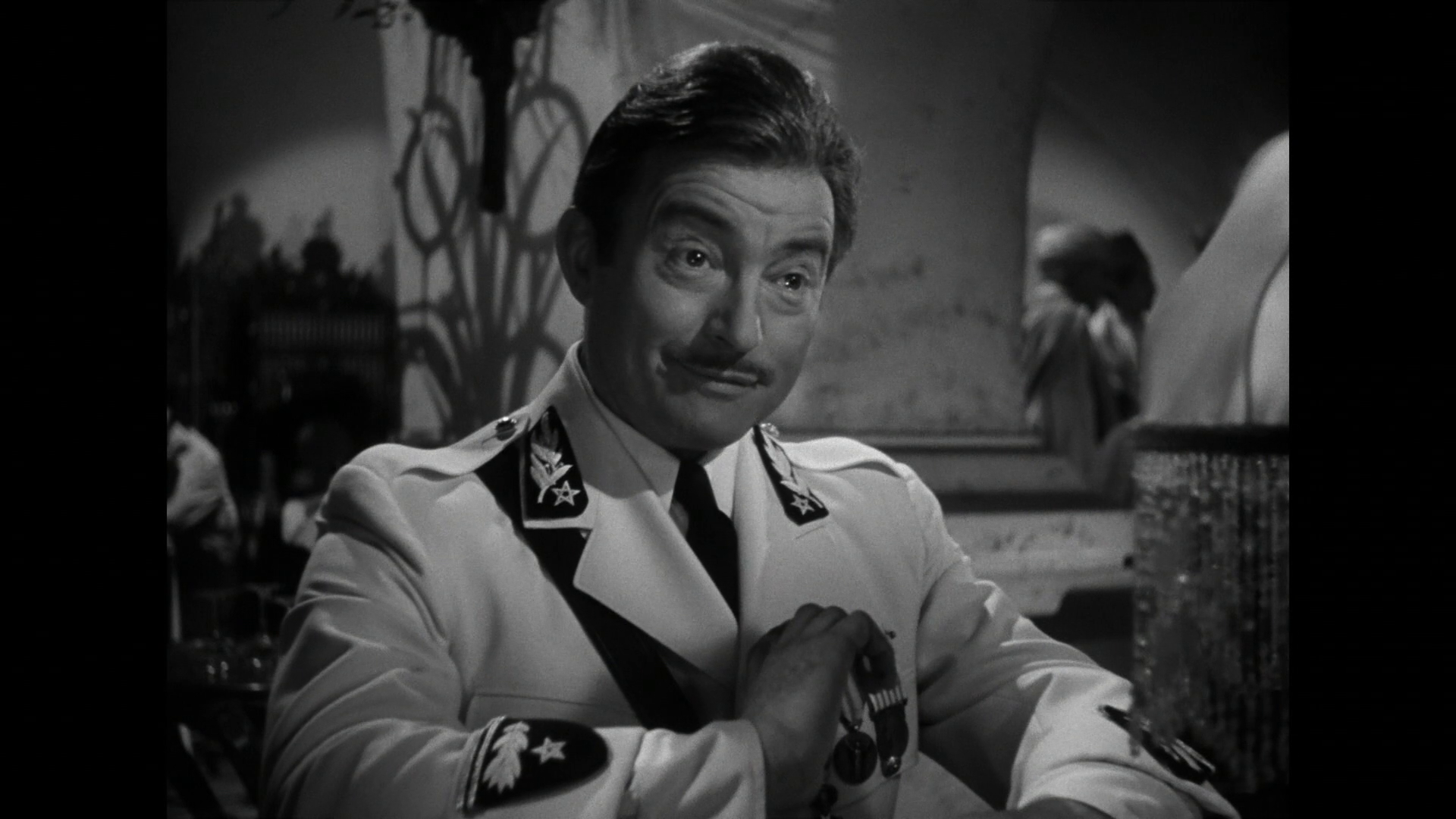 Claude Rains dans le film Casablanca (1942) de Michael Curtiz