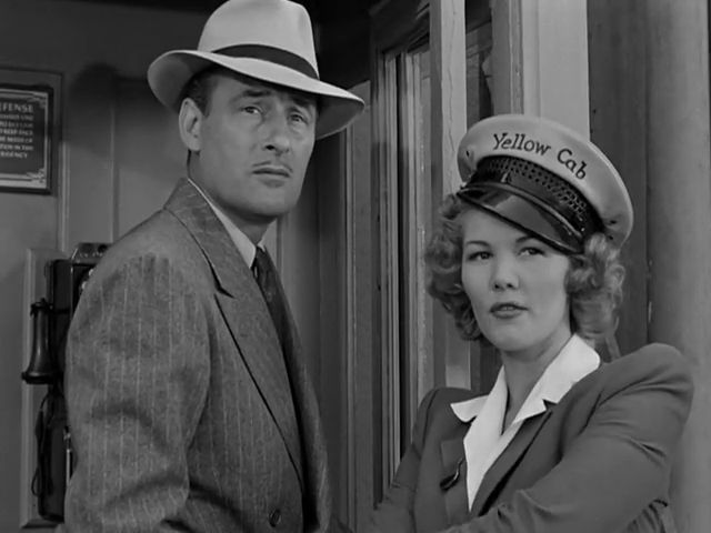 Tom Conway et Veda Ann Borg dans The Falcon in Hollywood (1944) de Gordon Douglas