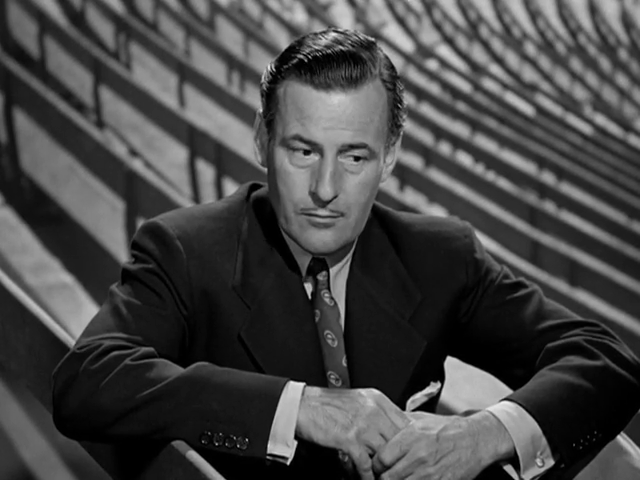 Tom Conway dans le film de détective The Falcon in Hollywood (1944) de Gordon Douglas