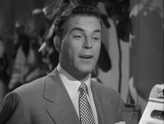 Scott Brady dans le film policier Undertow (Une balle dans le dos, 1949) de William Castle