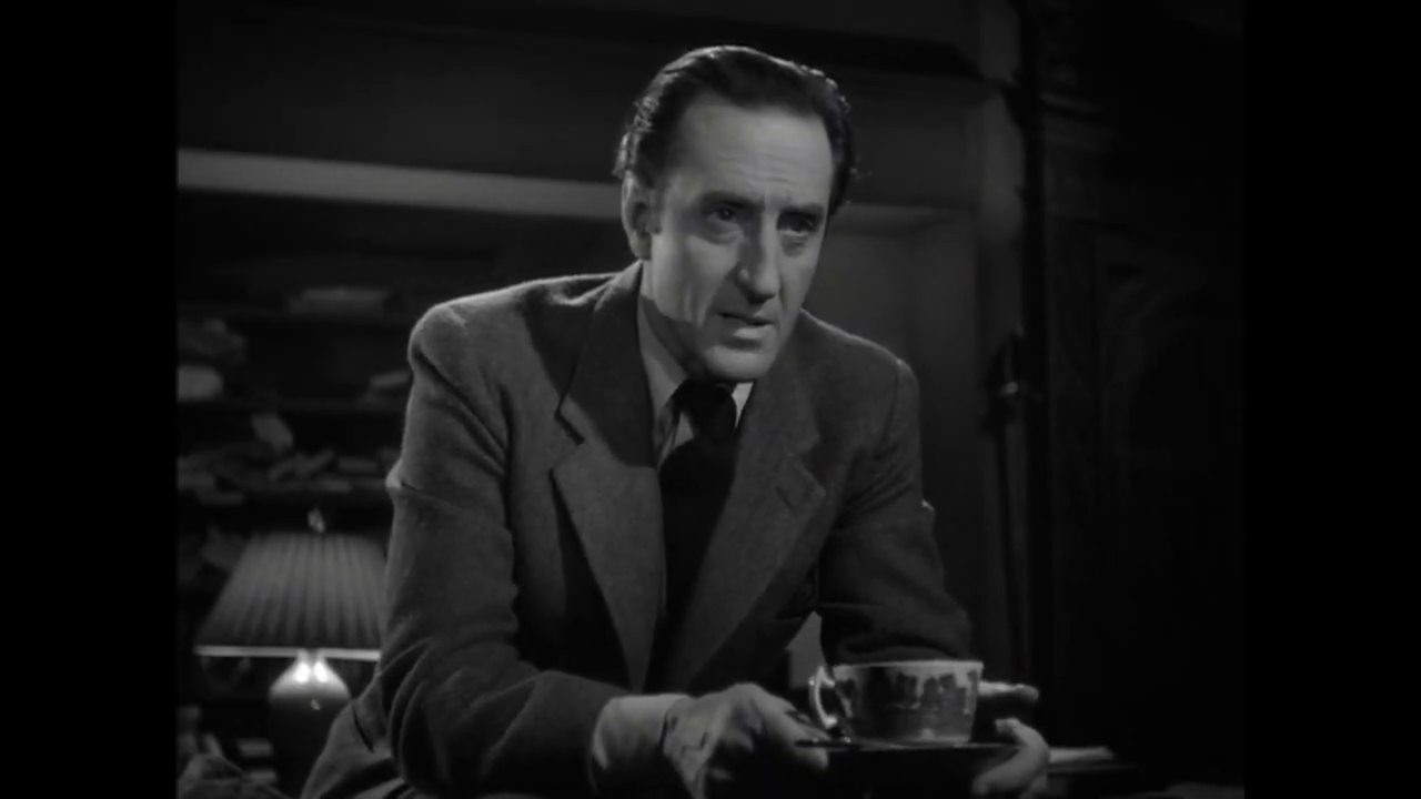 Basil Rathbone dans The woman in green (La femme en vert, 1945) de Roy William Neill
