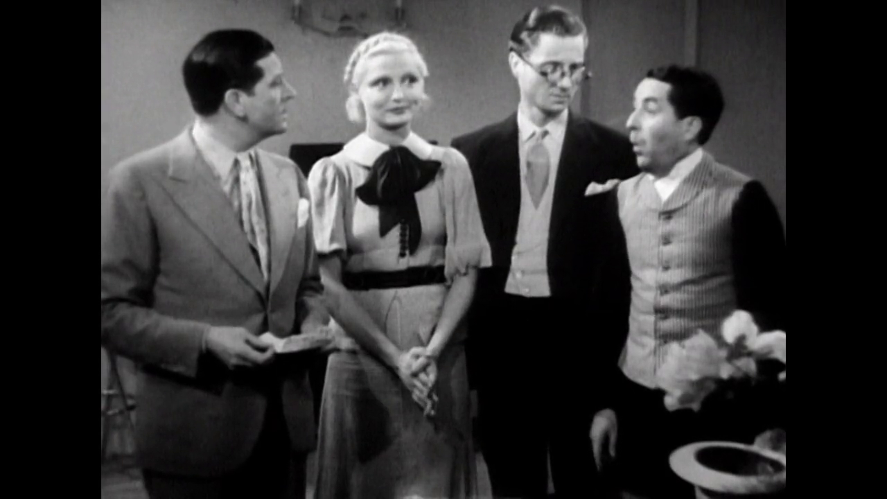 Albert Préjean, Michèle Béryl, Claude Dauphin et Julien Carette dans la comédie française La fessée (1937) de Pierre Caron