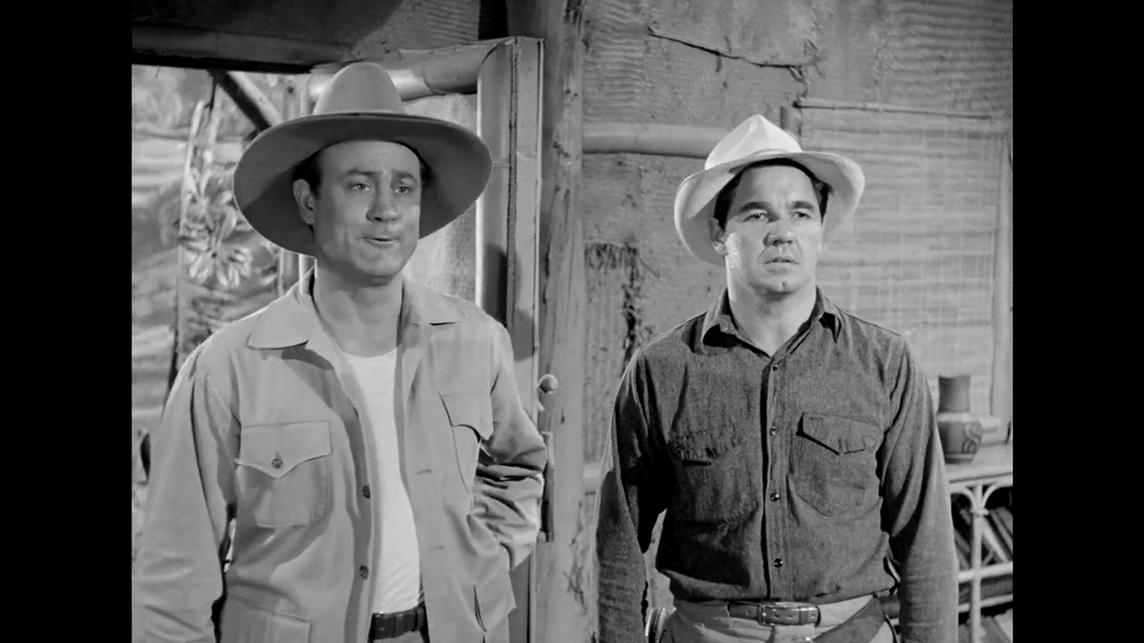 John Day et Mike Ragan dans le film américain à épisodes Panther girl of the Kongo (1955) de Franklin Adreon