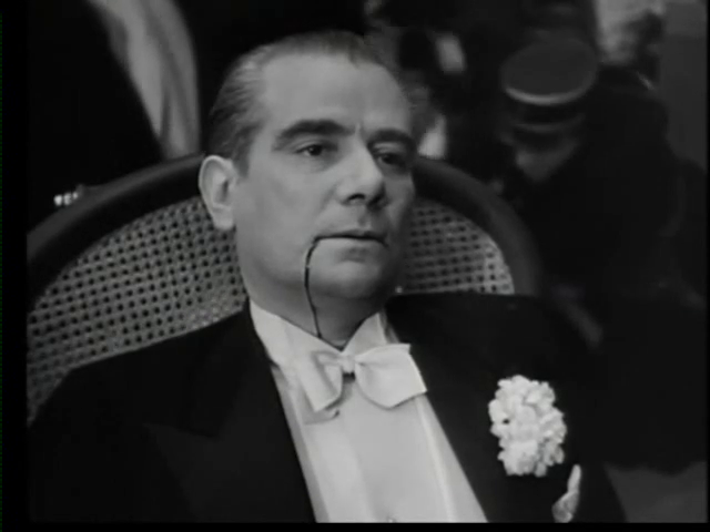 Marcel Herrand dans le film Le parfum de la dame en noir (1949) de Louis Daquin