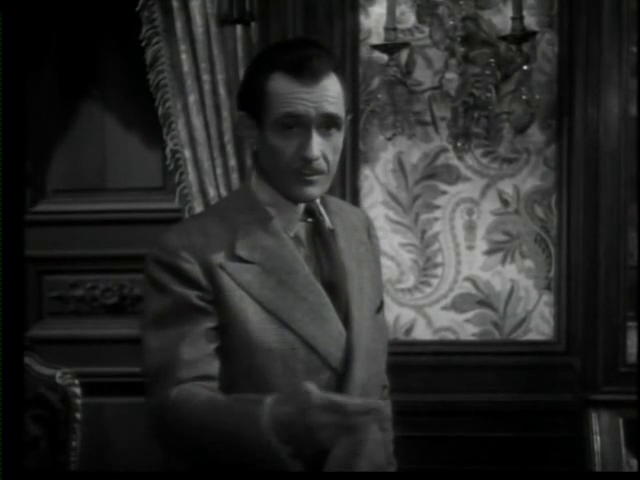 L'acteur Lucien Nat dans Le parfum de la dame en noir (1949) de Louis Daquin