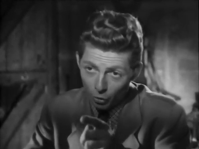 Yves Furet dans le film policier La femme en rouge (1947) de Louis Cuny