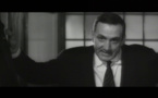 Lino Ventura dans le film La métamorphose des cloportes (1965) de Pierre Granier-Deferre 